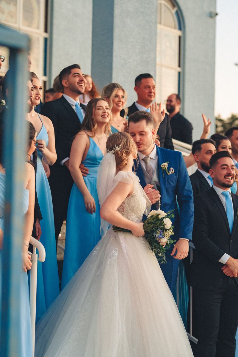 Bridesmaids and groomsmen celebrating together